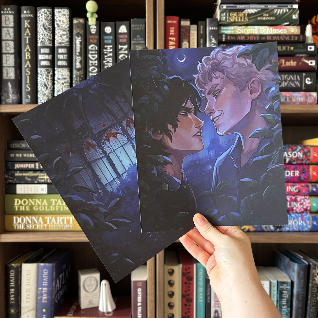 Two art prints featuring the front and back cover of the LitPins&Co edition of Hazelthorn by CG Drews. Prints are blue toned and feature the central couple and a greenhouse with a monster in it.