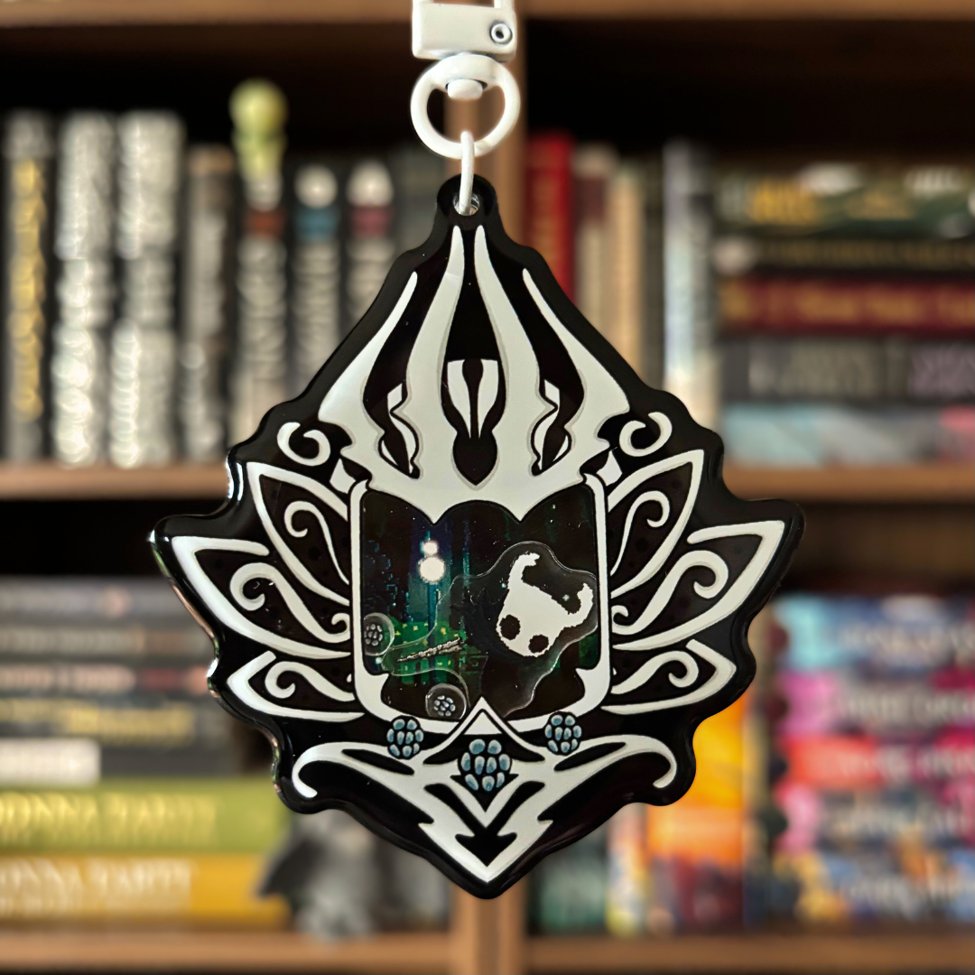 Black and white shaker keychain inspired by Hollow Knight