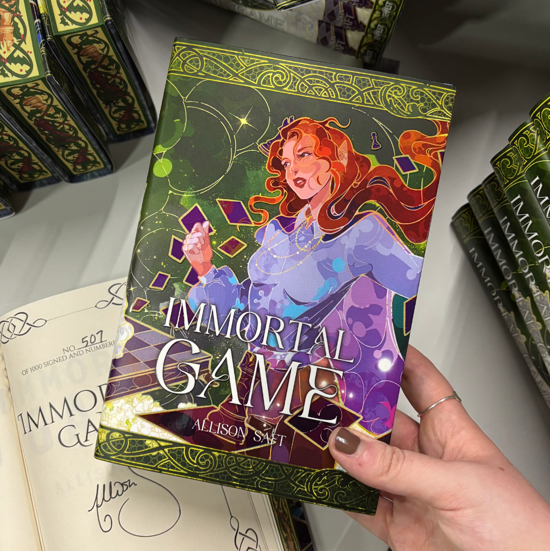 The LitPins&Co special edition of Immortal Game by Alison Saft, featuring a red-haired woman on a green cover