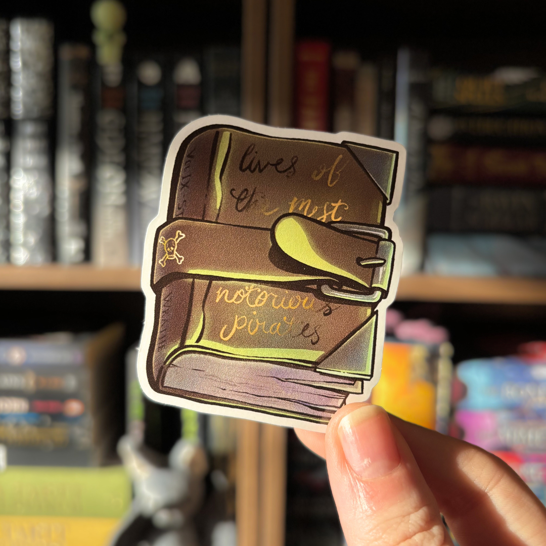 Officially licensed Vampirates book sticker, featuring a brown book with text reading "lives of the most notorious pirates"