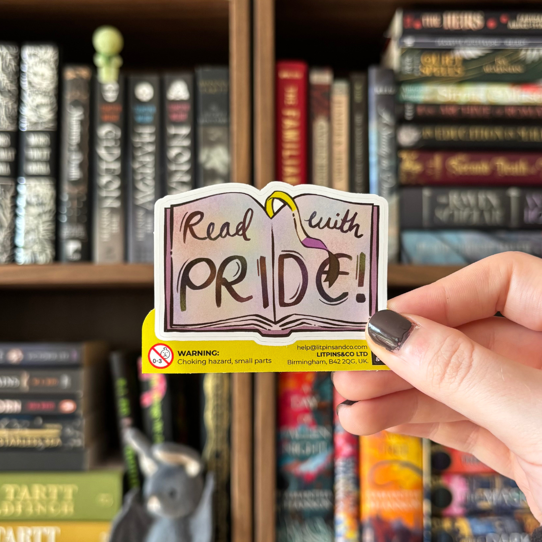 Book-shaped sticker with the text "Read with pride" decorated in colours of various pride flags