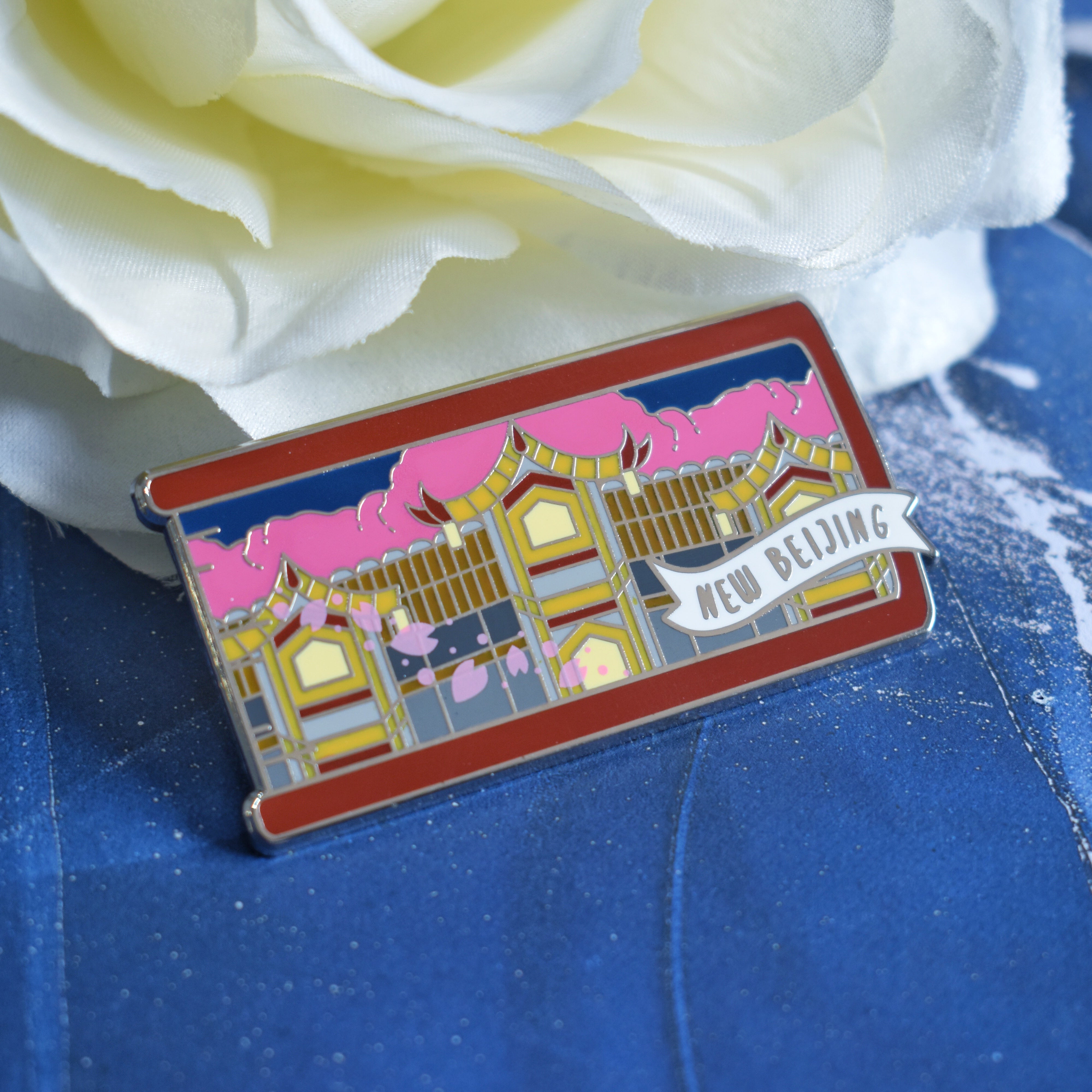 The Lunar Chronicles inspired enamel pin featuring New Beijing