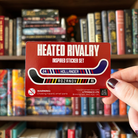 A heated rivalry inspired sticker sheet, featuring two hockey stick shaped stickers inspired by Shane and Ilya's hockey jerseys