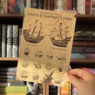 Art print depicting ships from the Vampirates universe, with text reading "The Most Notorious Pirate & Vampirate Ships"