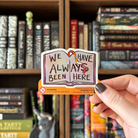 Book-shaped sticker with the text "We have always been here" decorated in colours of various pride flags
