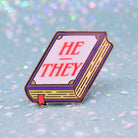 Book shaped pronoun pin on a decorative background 