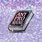Book shaped pronoun pin on a decorative background 
