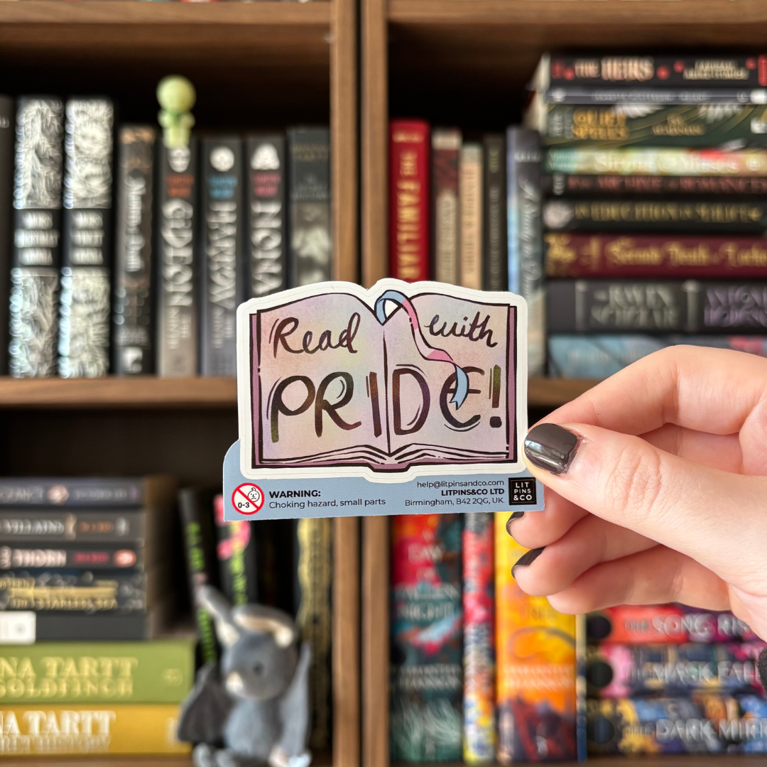 Book-shaped sticker with the text "Read with pride" decorated in colours of various pride flags