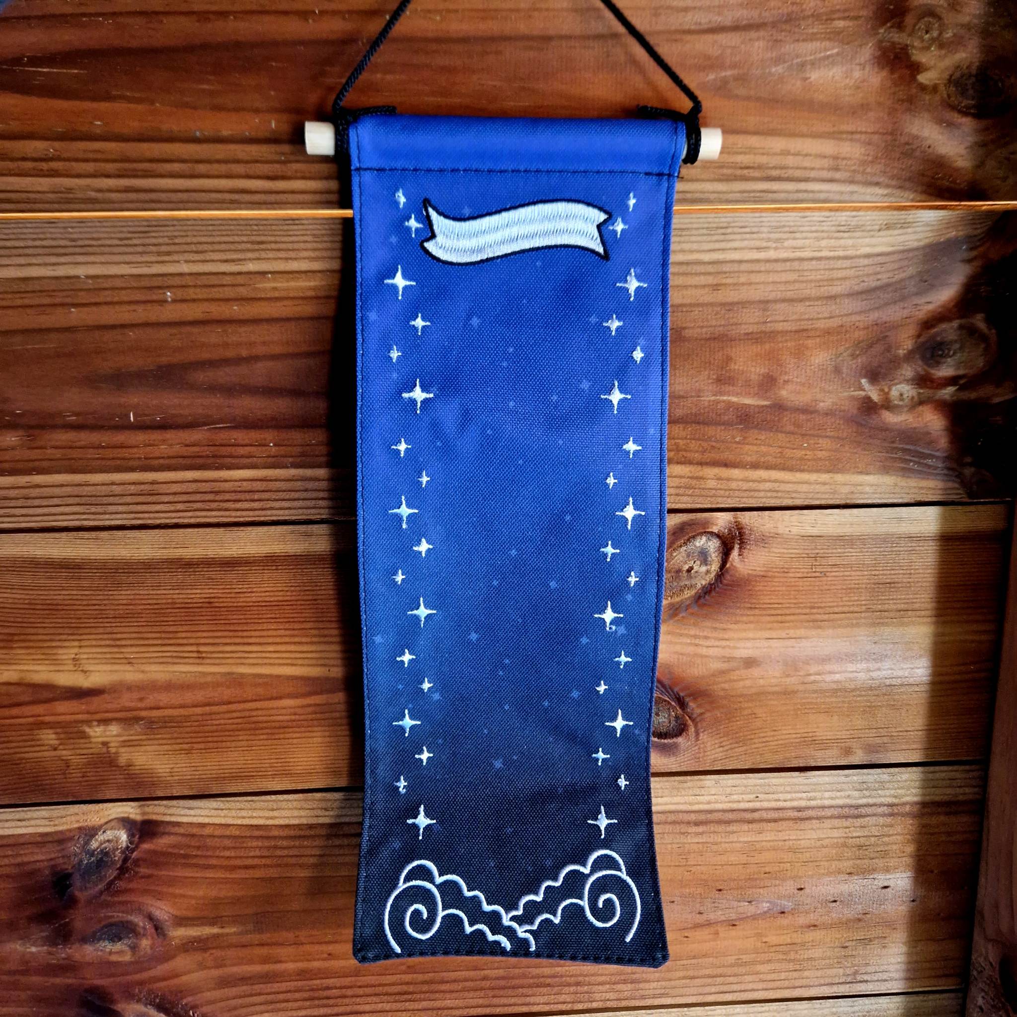 Book-themed decorative banner designed to display LitPins&Co and Felfiramoondesigns's Build Your Own Bookstack series, held against a bookshelf background