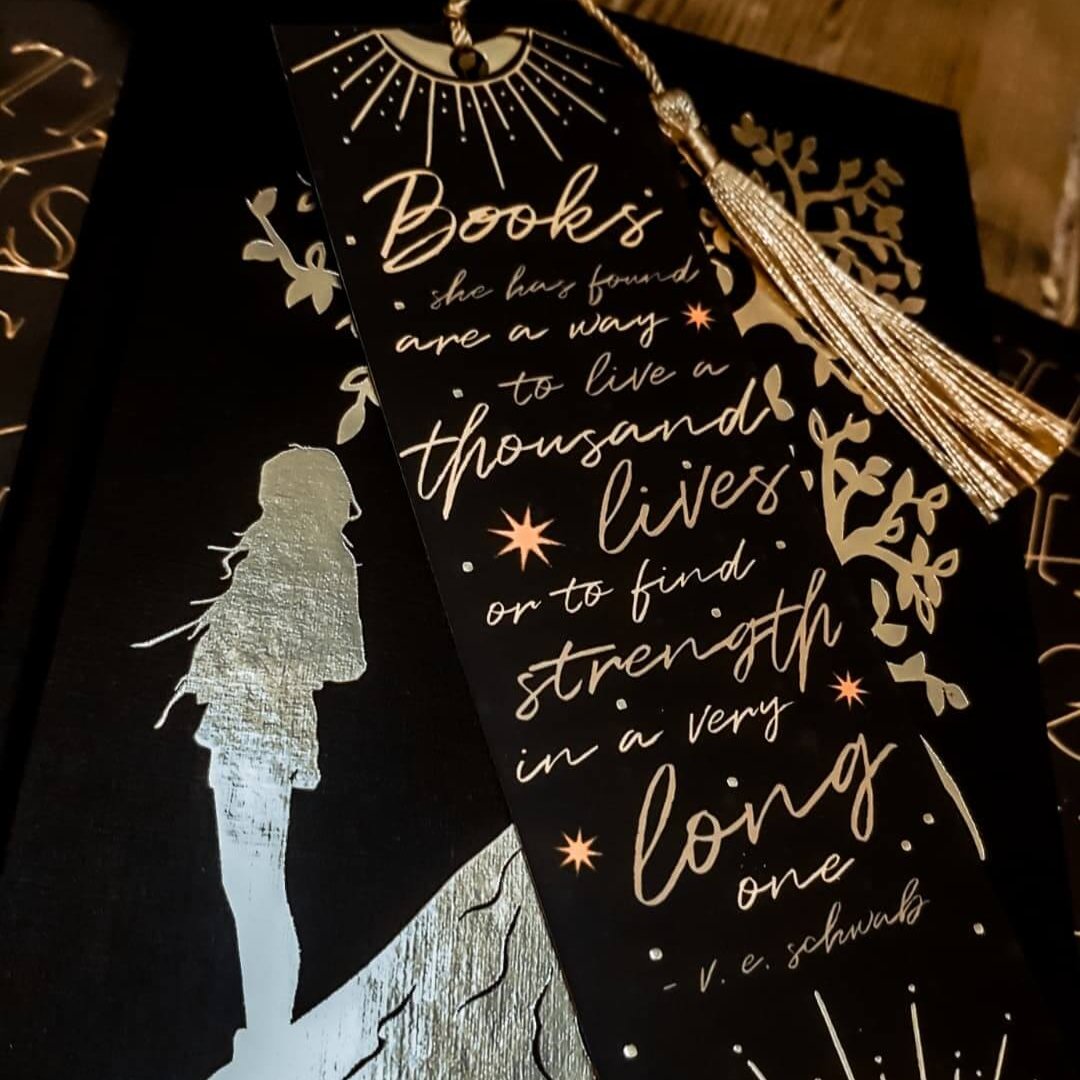 Books She Has Found, The Invisible Life of Addie LaRue by V.E Schwab bookmark with a golden tassel. 